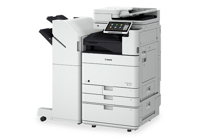 Canon DX6860i office multifunction copier, side profile showing the paper drawers